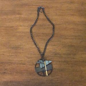 Necklace with handmade metal pendant